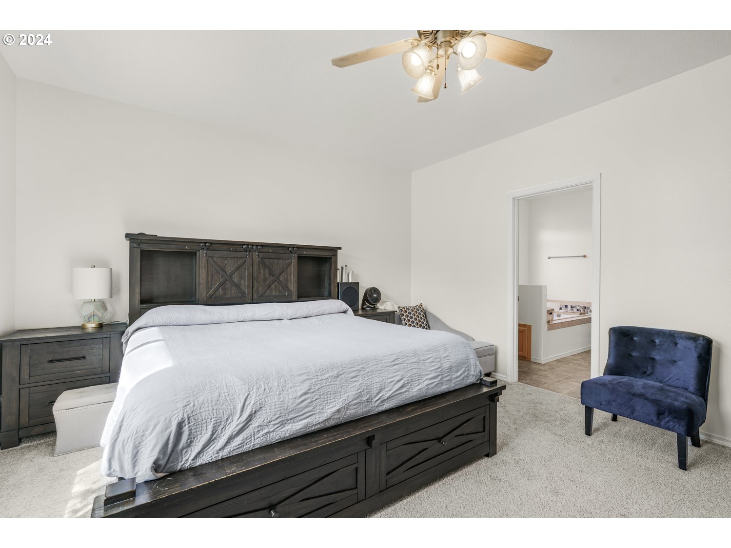 1514 West E Place La Center, WA 98629 - Photo 9 of 26 a bedroom with a bed and window