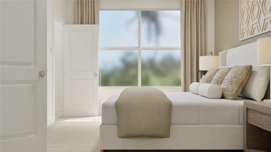 2639 Lasso Loop Eagle Lake, FL 33839 - Photo 18 of 34 a bedroom with a bed and a window