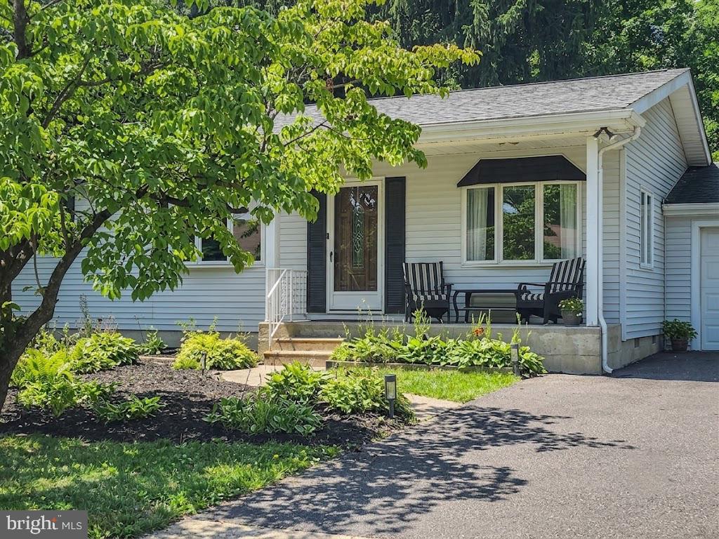 33 Delwood Road Cherry Hill, NJ 08002 - Photo 2 of 27 Charming home with lush greenery.