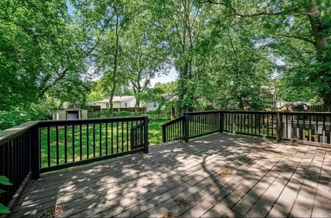 a view of backyard with green space