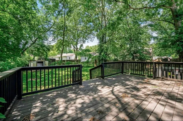 a view of backyard with green space