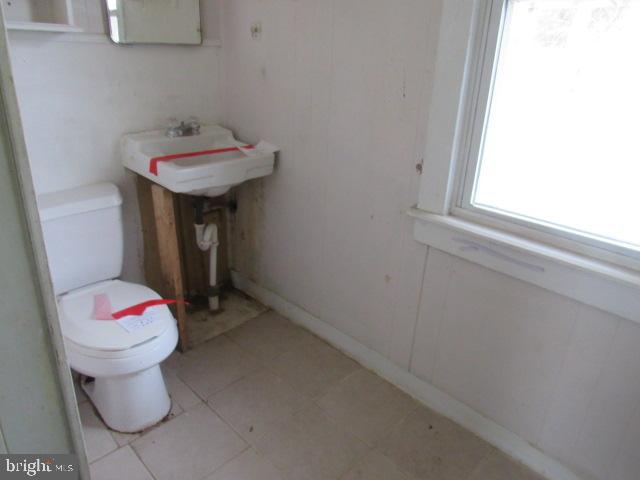 172 Boston Road Pennsville, NJ 08070 - Photo 8 of 9 a bathroom with a sink toilet and a mirror