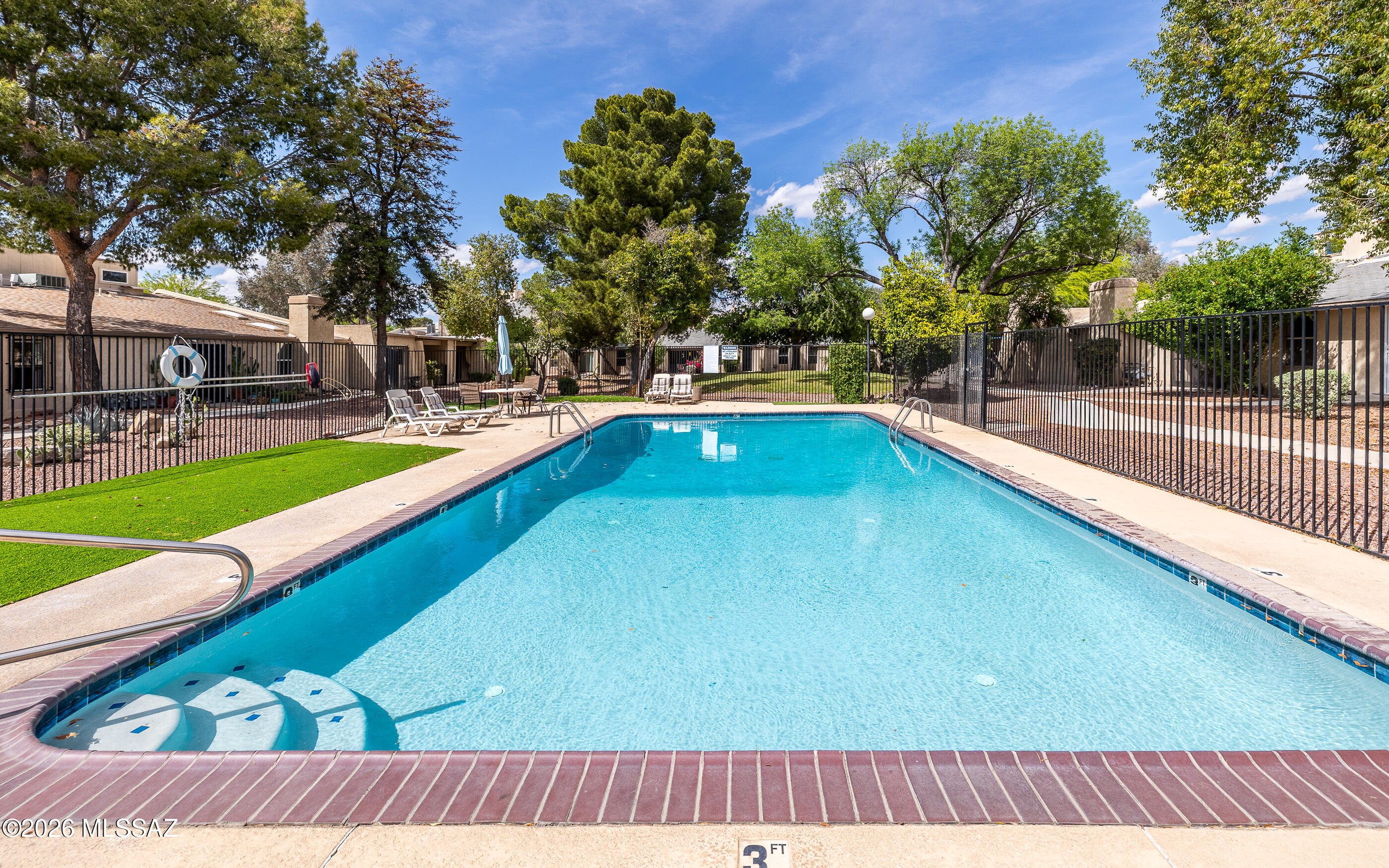 3750 North Country Club Road, Unit 46 Tucson, AZ 85716 - Photo 32 of 34 a view of swimming pool with seating space