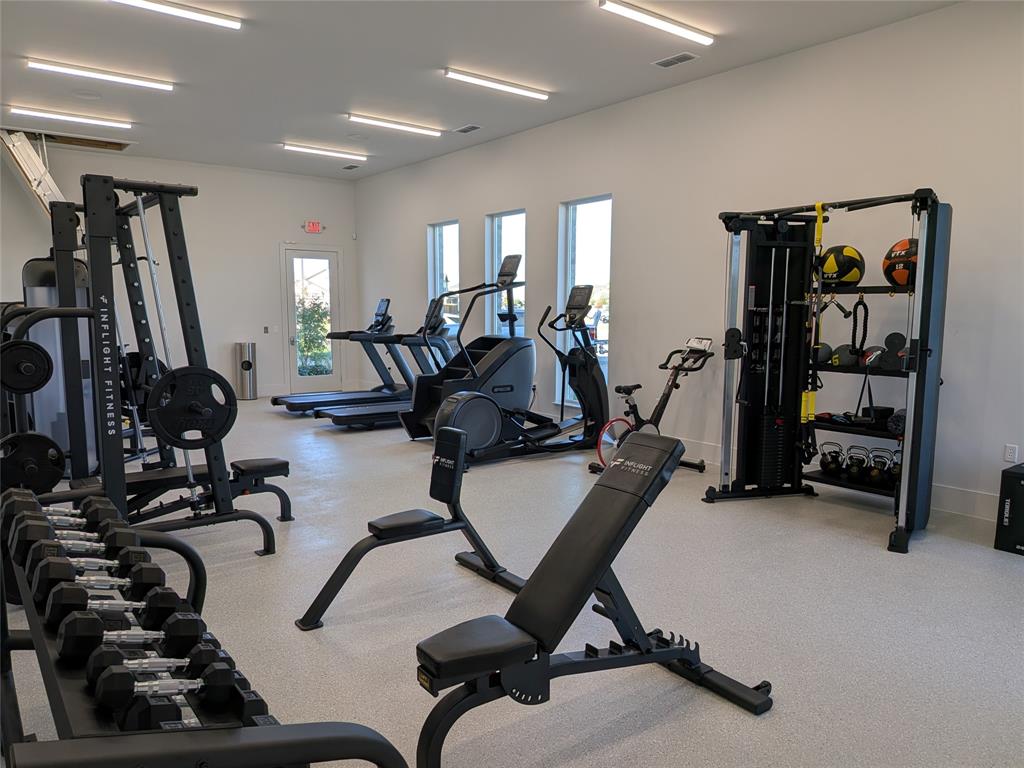 14004 Gaskin Street Pilot Point, TX 76258 - Photo 20 of 31 a view of a room with gym equipment