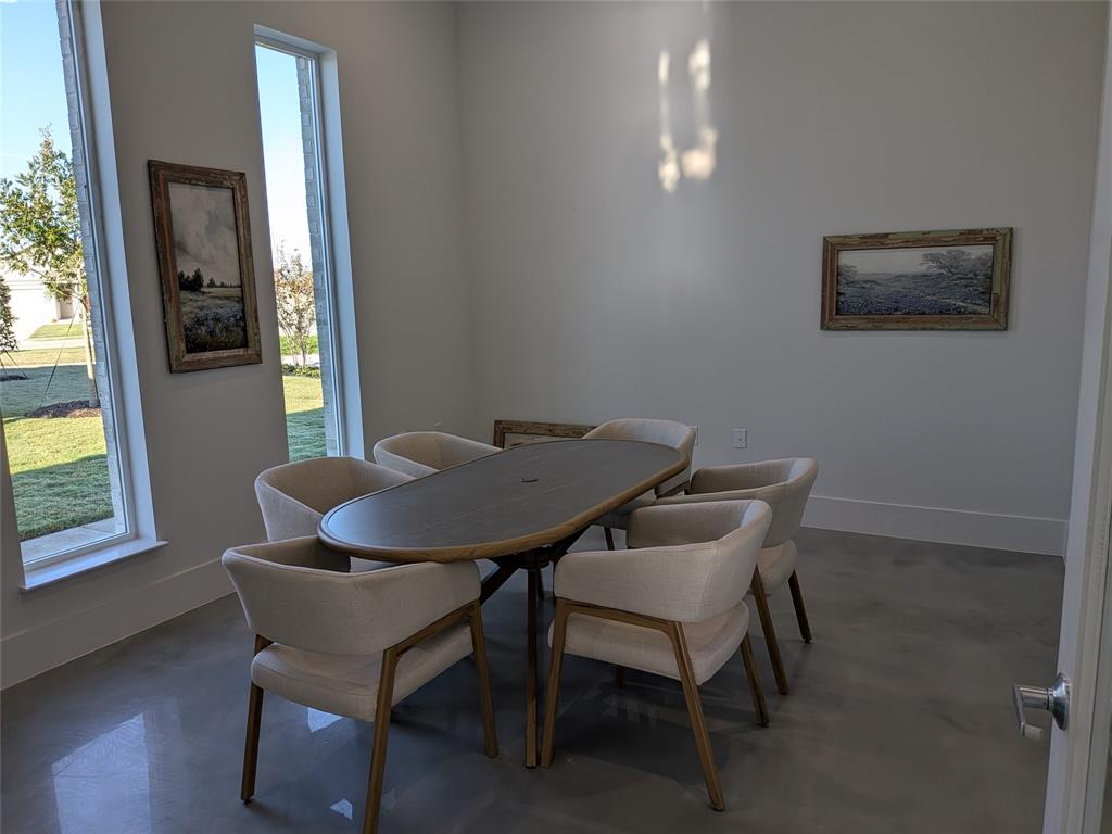 14004 Gaskin Street Pilot Point, TX 76258 - Photo 21 of 31 a view of a dining room with furniture and wooden floor
