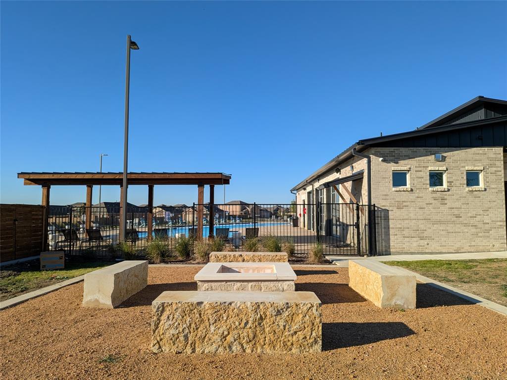 14004 Gaskin Street Pilot Point, TX 76258 - Photo 23 of 31 a view of a house with a patio