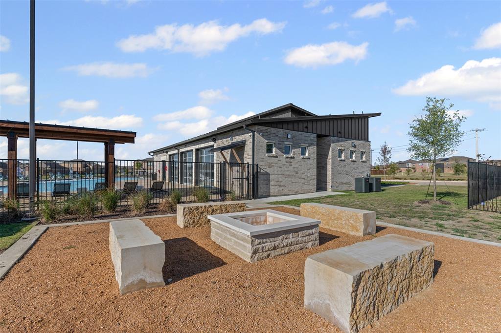 14004 Gaskin Street Pilot Point, TX 76258 - Photo 28 of 31 a view of a house with pool and chairs