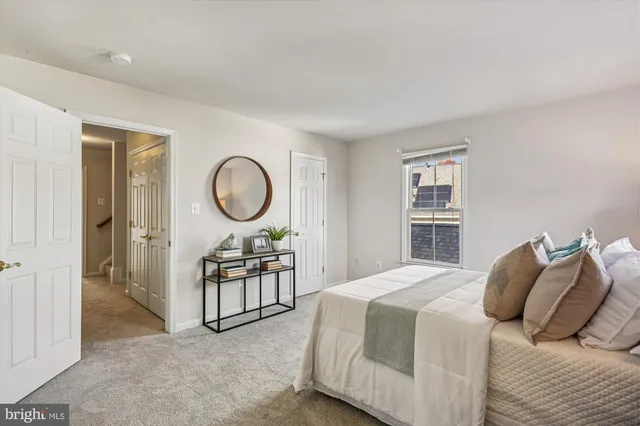 a white bath tub sitting next to a window