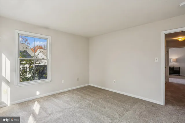 an empty room with an entryway