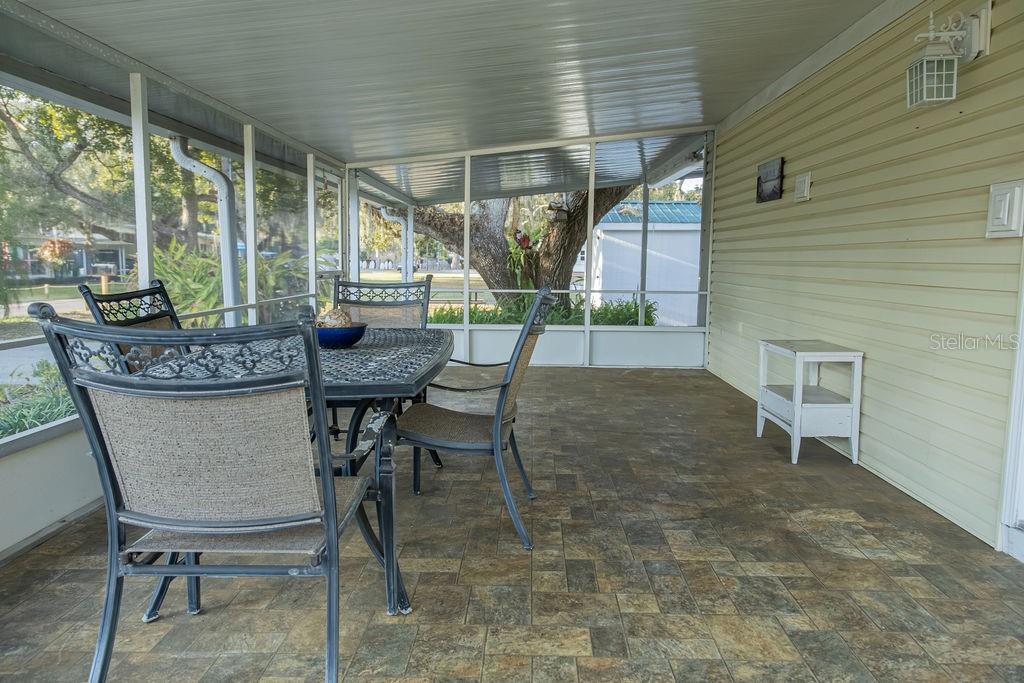 23 Anchor Inn Road Lake Wales, FL 33898 - Photo 6 of 46 a view of a patio with table and chairs