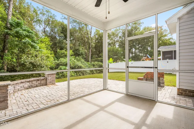 a view of a swimming pool with a balcony