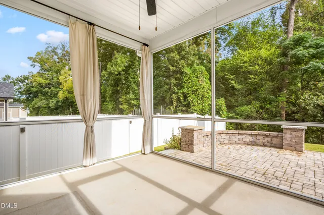 a view of a porch and garden