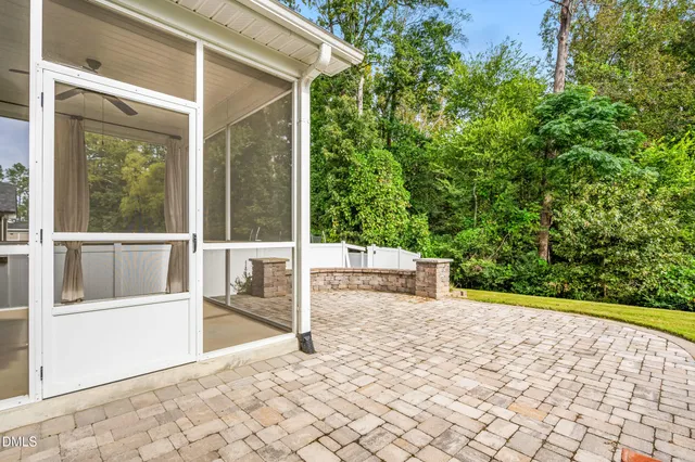 a view of a back yard from a patio