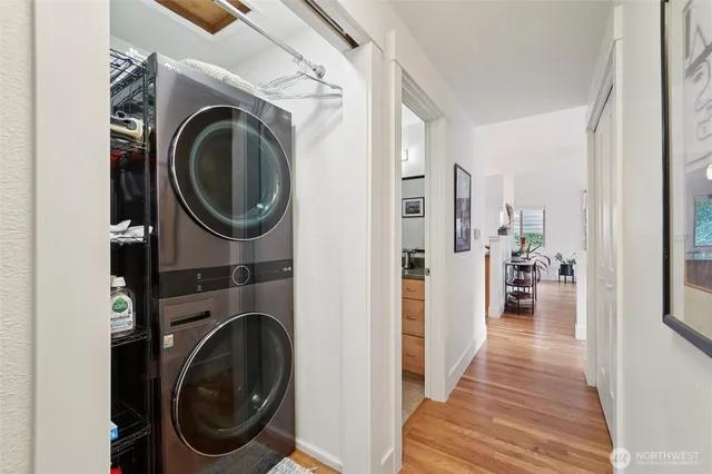 a view of a hallway with washer and dryer