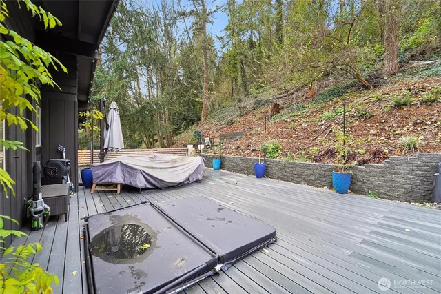 a view of a patio with wooden floor