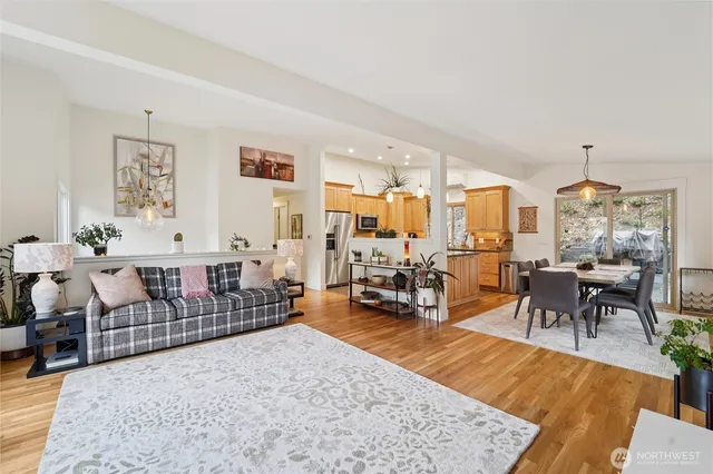 a living room with furniture and a table