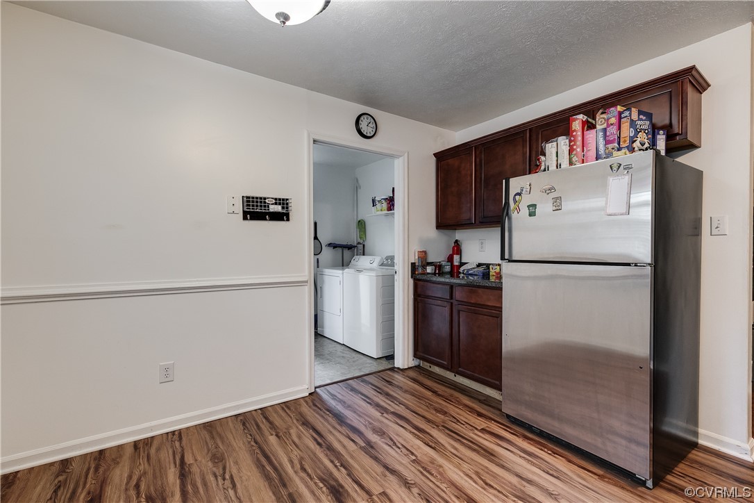 227 Hodder Lane Henrico, VA 23075 - Photo 11 of 24 a white refrigerator freezer and a stove sitting inside of a kitchen