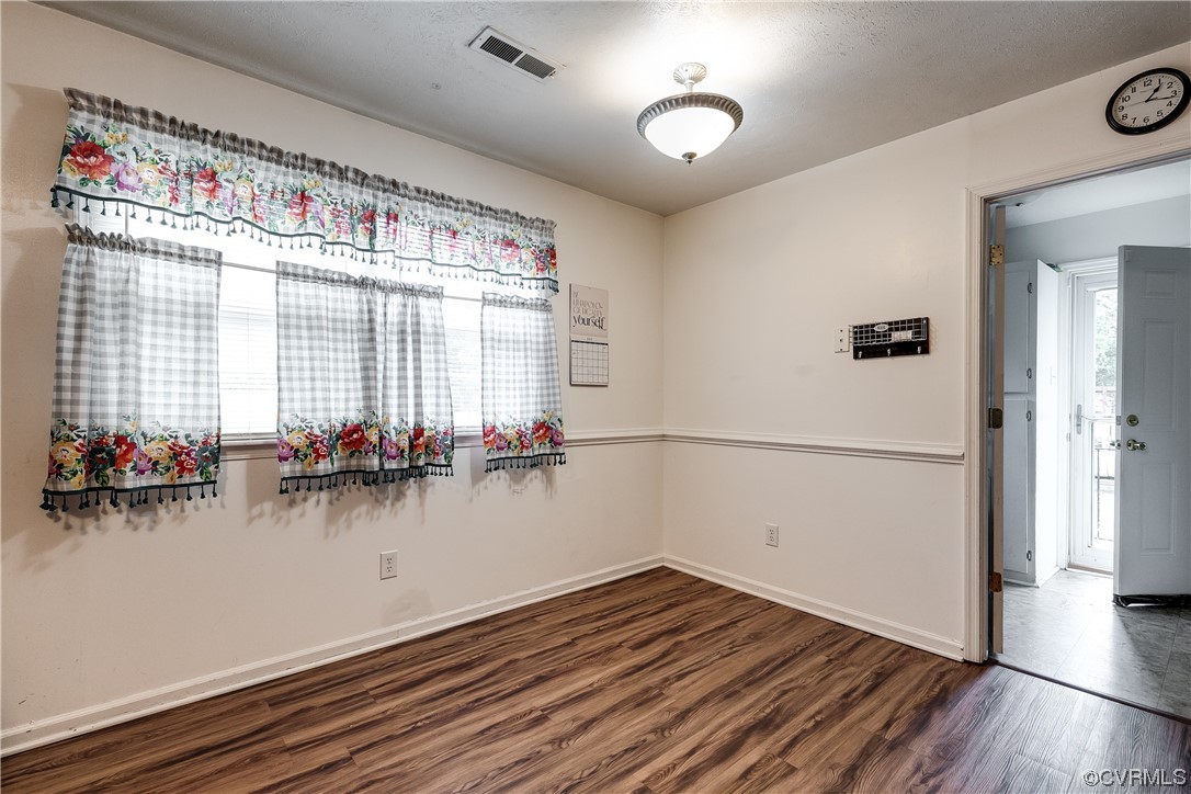 227 Hodder Lane Henrico, VA 23075 - Photo 12 of 24 a view of a room with wooden floor and furniture