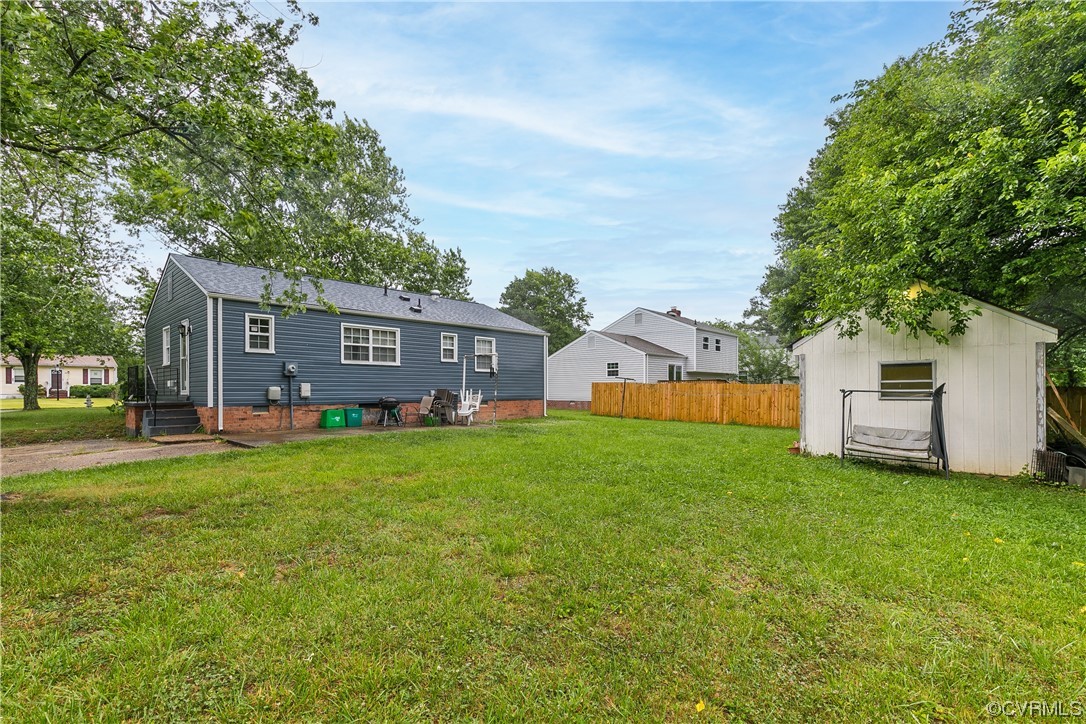 227 Hodder Lane Henrico, VA 23075 - Photo 23 of 24 a front view of a house with yard and green space