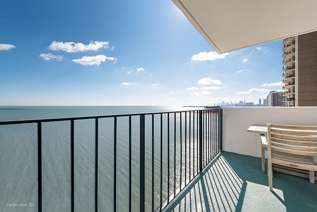 6033 North Sheridan Road, Unit 16A Chicago, IL 60660 - Photo 3 of 21 a view of a balcony with wooden floor