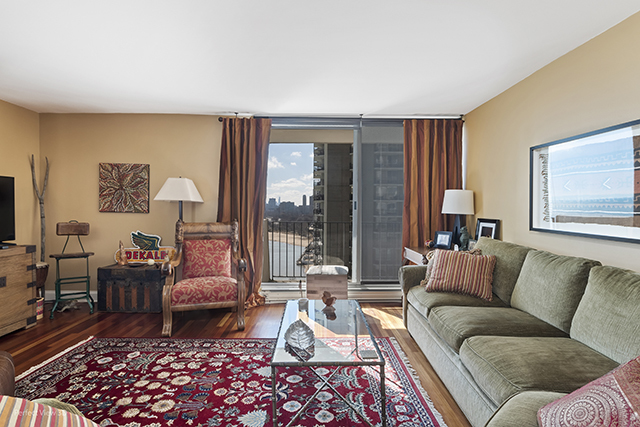 6033 North Sheridan Road, Unit 16A Chicago, IL 60660 - Photo 9 of 21 a living room with furniture and a large window