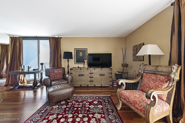 6033 North Sheridan Road, Unit 16A Chicago, IL 60660 - Photo 10 of 21 a living room with furniture or outdoor view and a large window