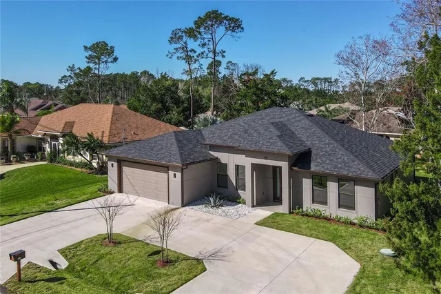 a house view with a garden space