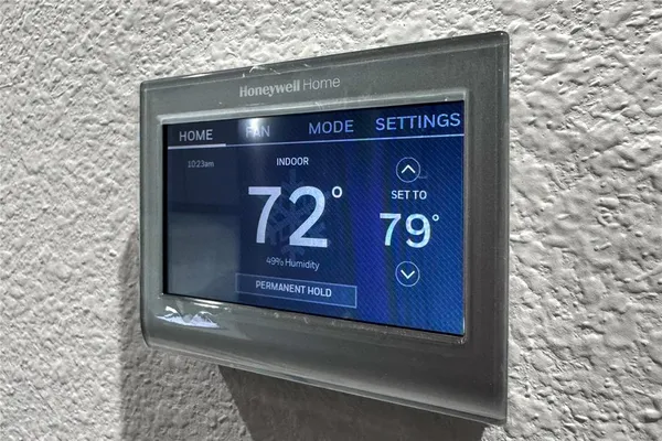 a large kitchen with kitchen island a sink stainless steel appliances and cabinets