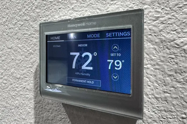 a large kitchen with kitchen island a sink stainless steel appliances and cabinets