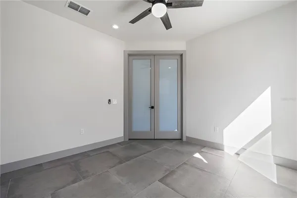 a bathroom with a double vanity sink and mirror