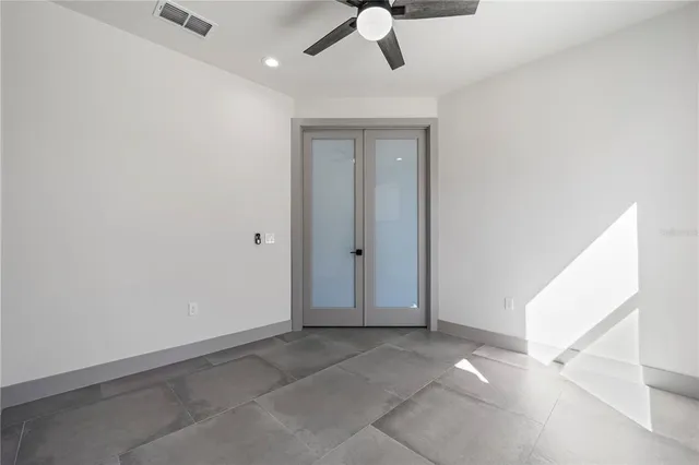 a bathroom with a double vanity sink and mirror