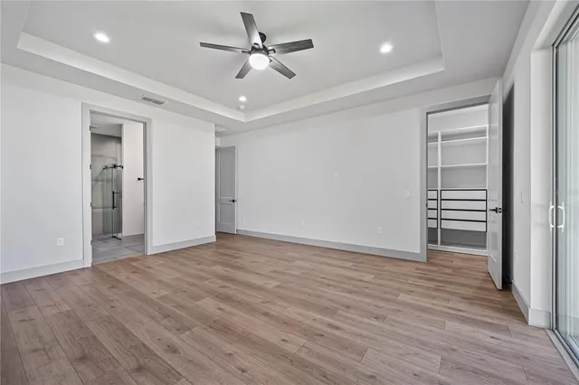 a view of a hallway with stairs