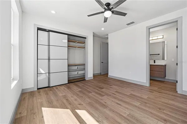 a bathroom with a toilet sink and shower
