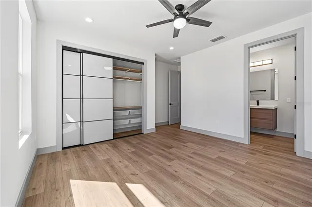 a bathroom with a toilet sink and shower