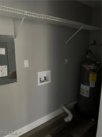 a bathroom with a granite countertop toilet a sink and bathtub