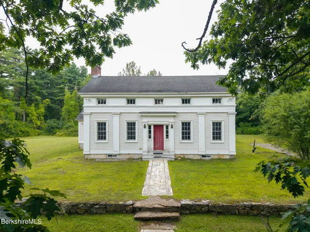 a view of a house with a swimming pool