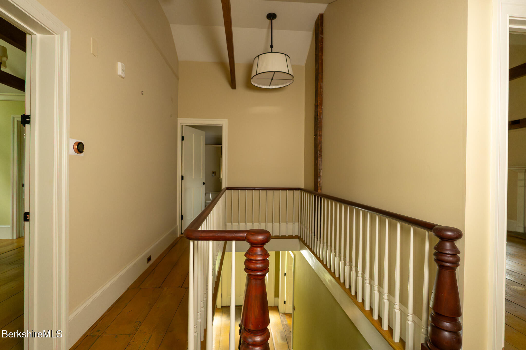 560 Stockbridge Road Lee, MA 01238 - Photo 22 of 48 a view of a hallway with wooden floor