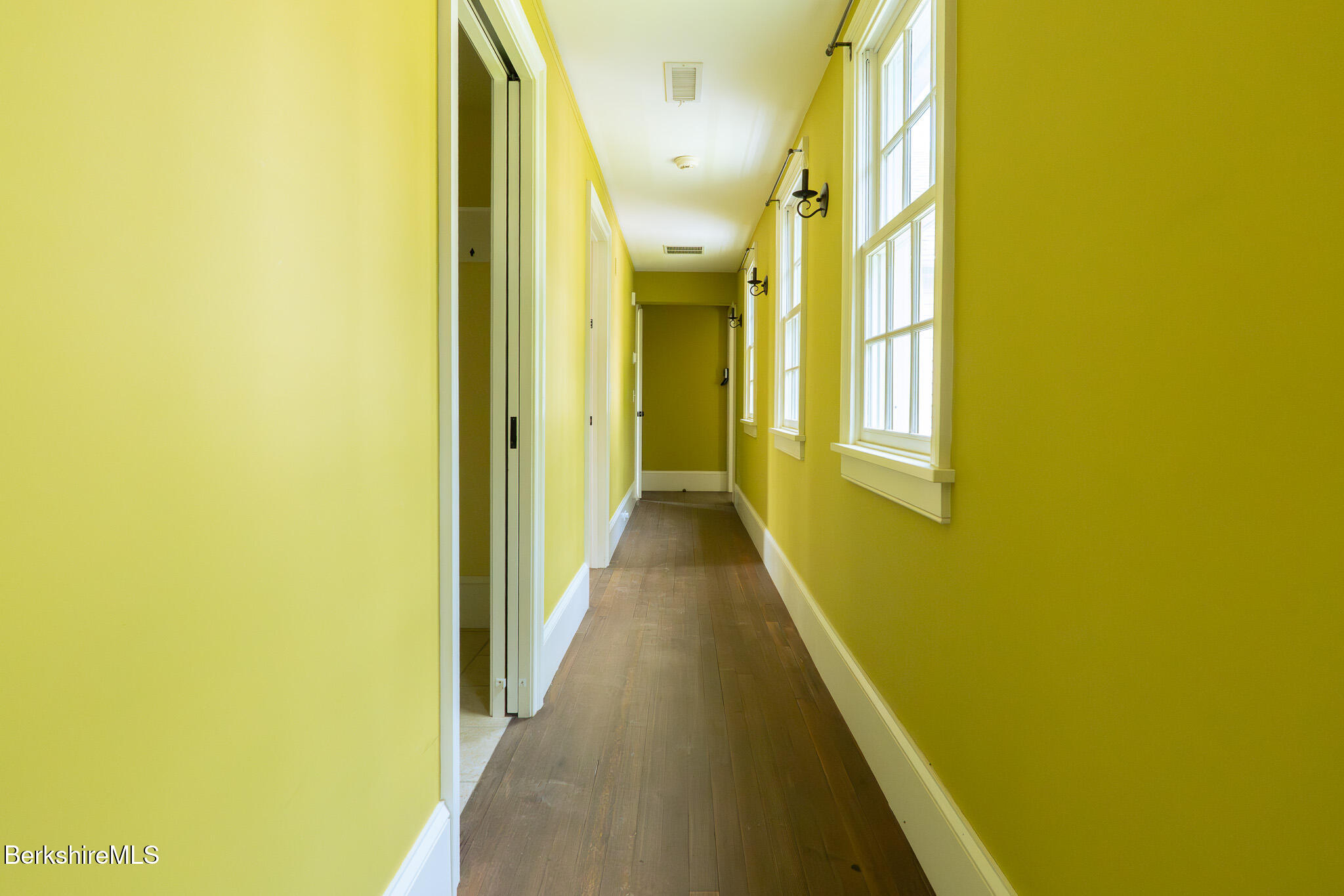 560 Stockbridge Road Lee, MA 01238 - Photo 28 of 48 a view of a hallway with windows