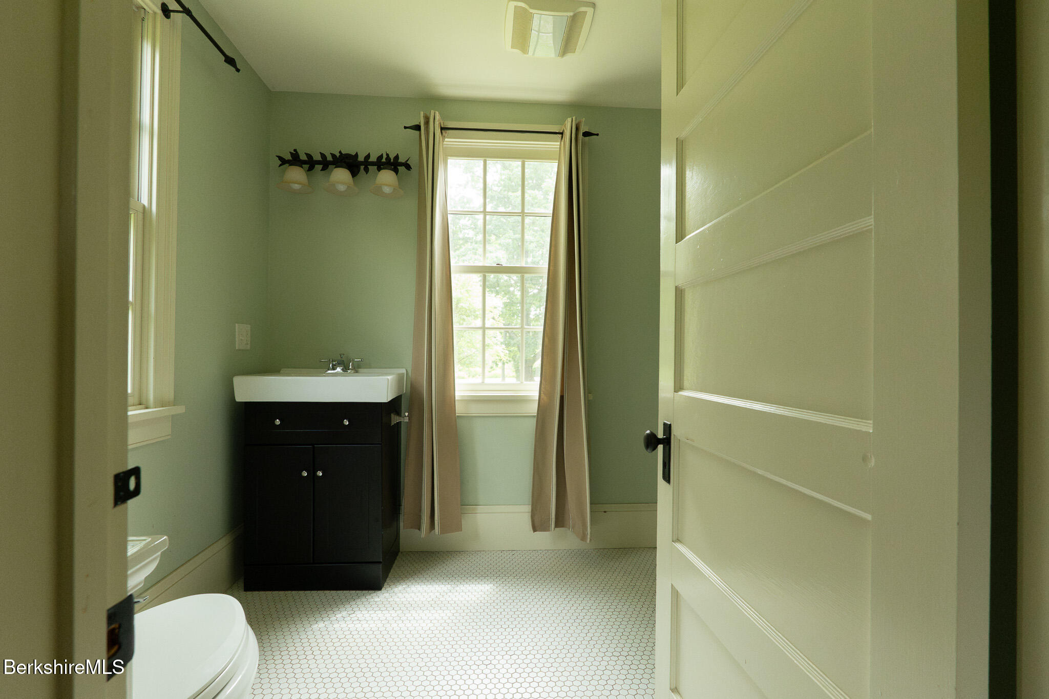 560 Stockbridge Road Lee, MA 01238 - Photo 40 of 48 a bathroom with a granite countertop sink toilet and shower