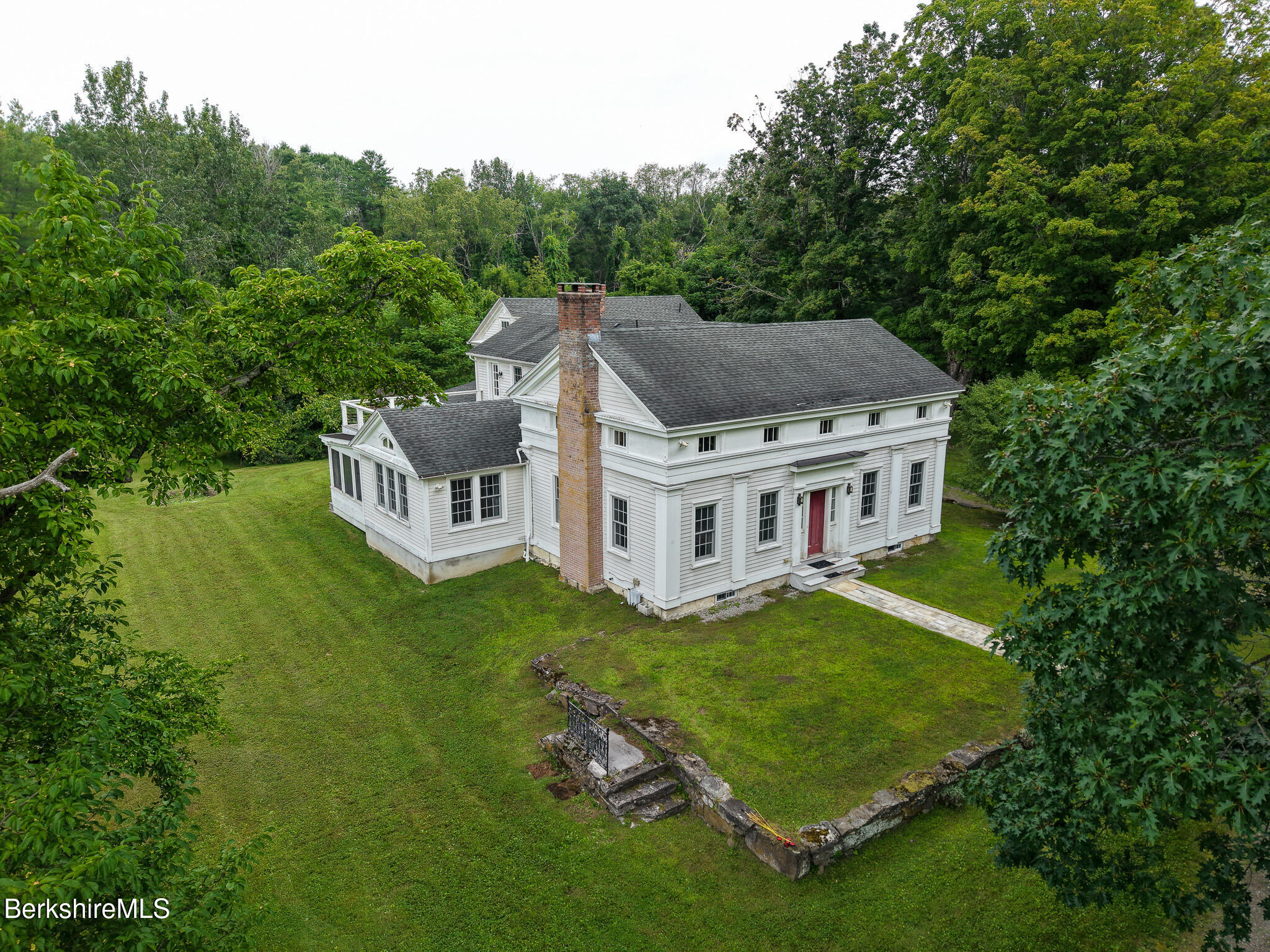 560 Stockbridge Road Lee, MA 01238 - Photo 45 of 48 a view of a house with a big yard plants and large trees