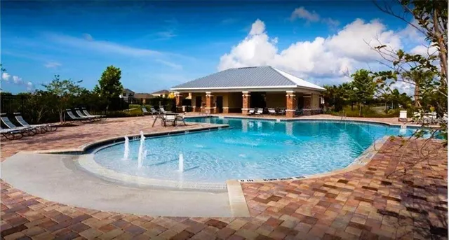 a view of a house with swimming pool