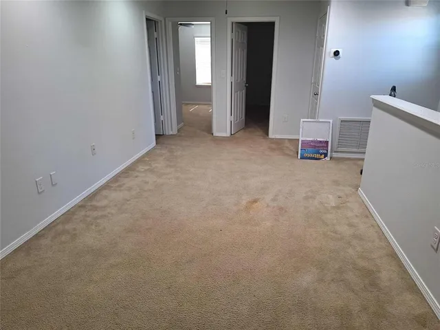 a view of a room with an empty room