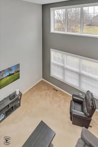 a room with a bed and a window