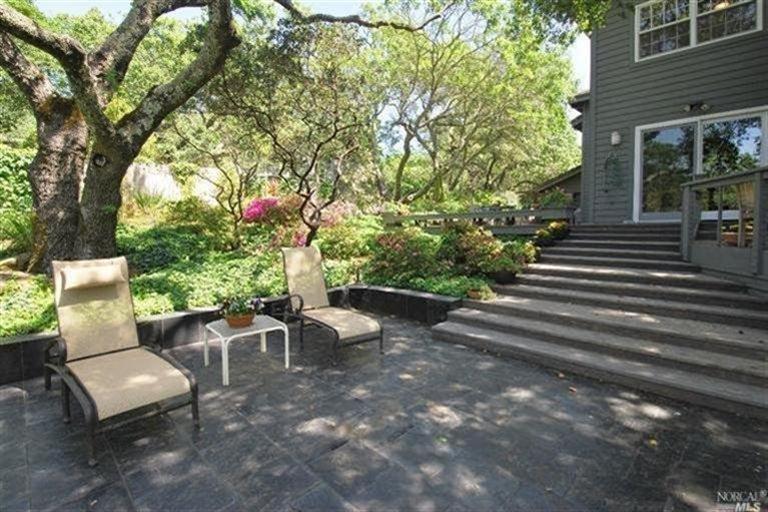 17707 High Road Sonoma, CA 95476 - Photo 1 of 1 Expansive approximately .86 acre parcel with view and room for a pool. Pictured: One of three entertaining decks accessed by the home. Decks access gentle parcel.