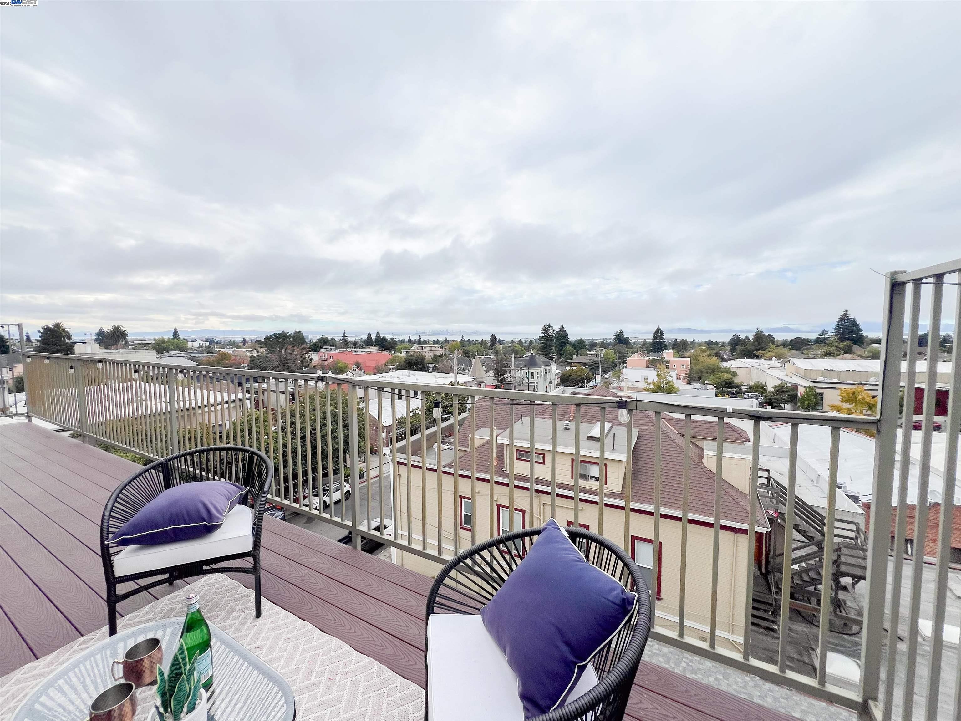 1444 Walnut Street Berkeley, CA 94709 - Photo 23 of 58 a view of a balcony with wooden floor
