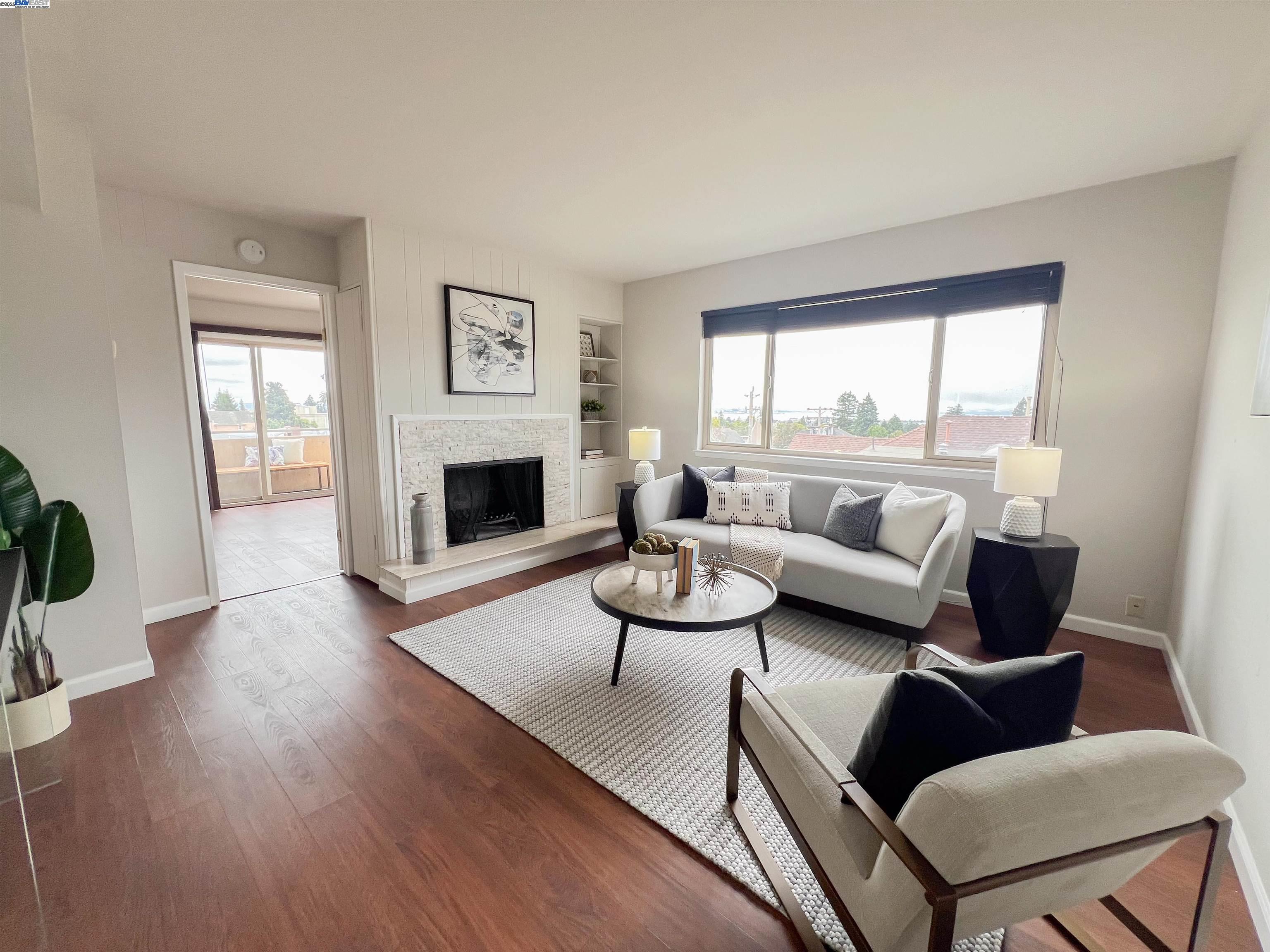1444 Walnut Street Berkeley, CA 94709 - Photo 4 of 58 a living room with furniture fireplace and window