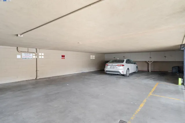 a bathroom with a bathtub and a window