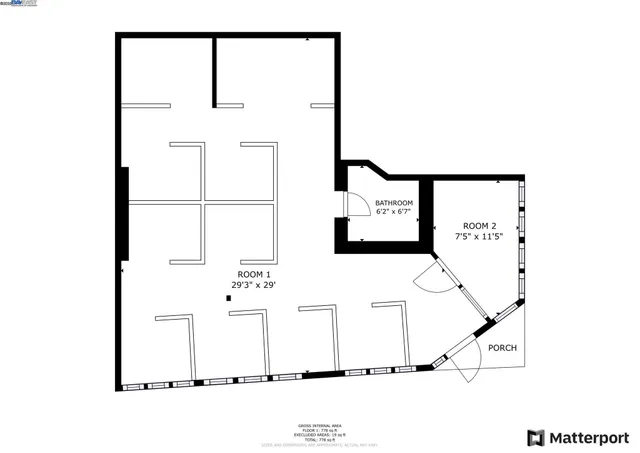 a view of a kitchen with furniture and a kitchen