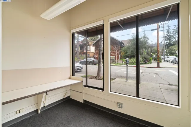 a aerial view of a multi story building with yard