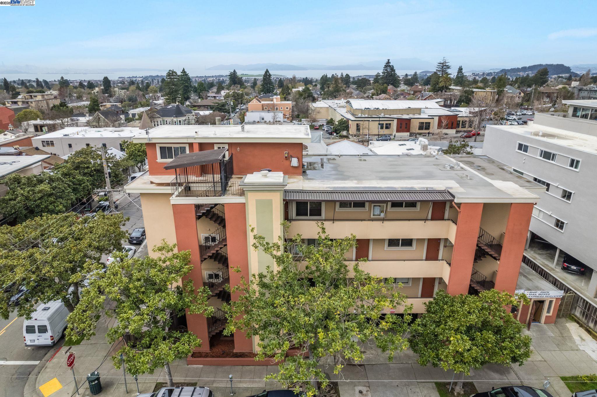 1444 Walnut Street Berkeley, CA 94709 - Photo 52 of 58 a aerial view of a multi story building with yard